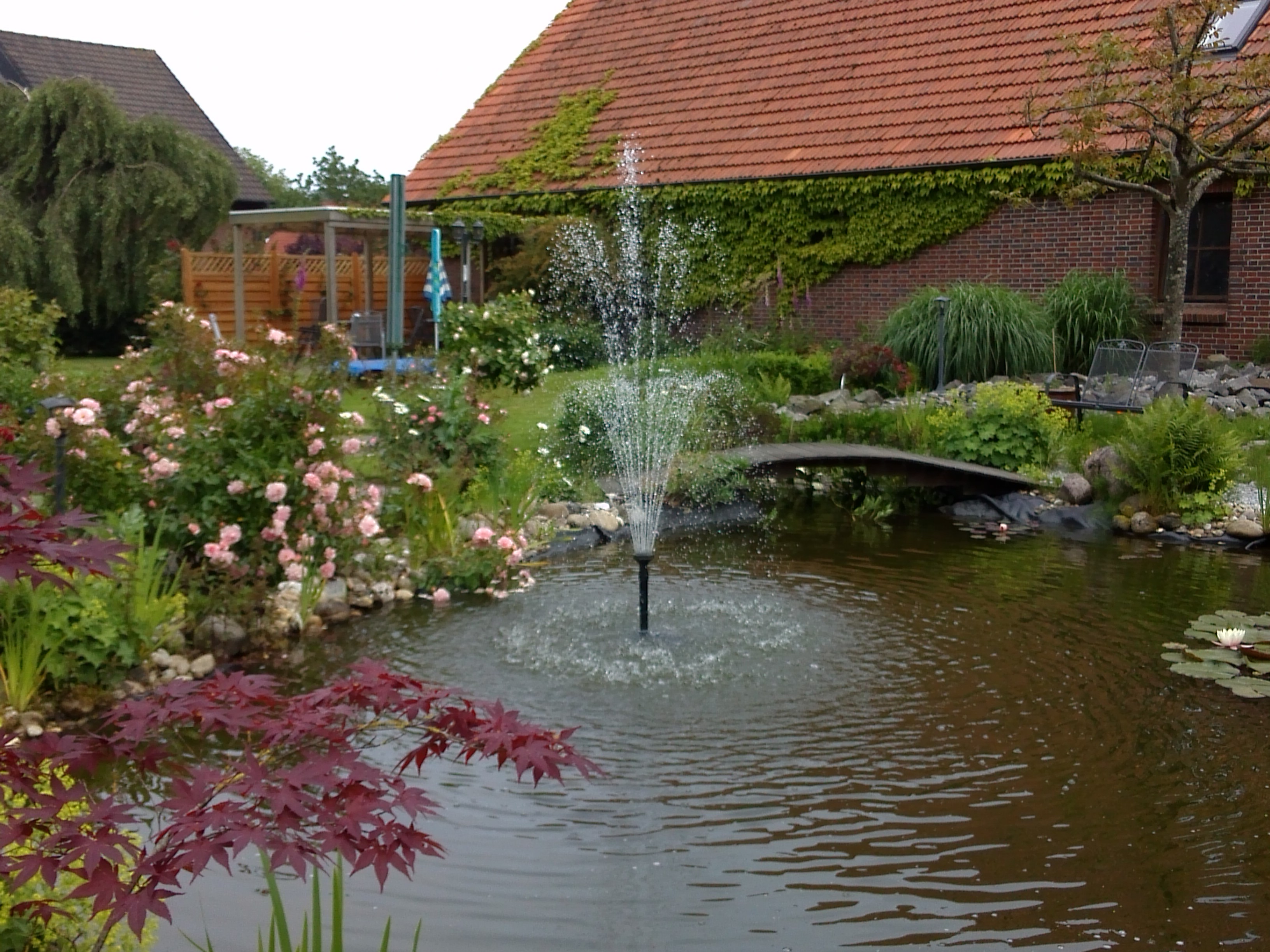 Pension Forke - Gepflegter Garten mit Sitzgelegenheiten